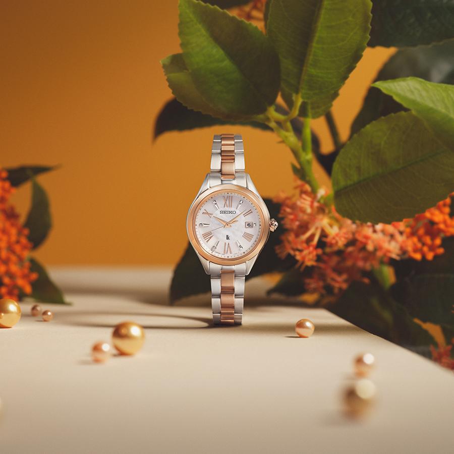 Seiko LUKIA Grow Osmanthus SSQW096 Women's Solar Radio-Controlled Watch with Titanium and White Mother-of-Pearl Dial in Pink Gold, Two-Tone