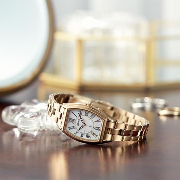 Seiko Lukia Lady Gold SSQW046 Women's Watch, Solar, Radio-Controlled, Titanium, Water Resistant, Date Display, Tonneau Movement, Mother-of-Pearl Dial with Diamonds